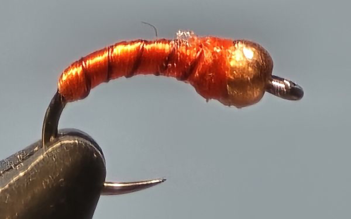 Firebug Midge - Orange fly pattern tied by Darrell Olson