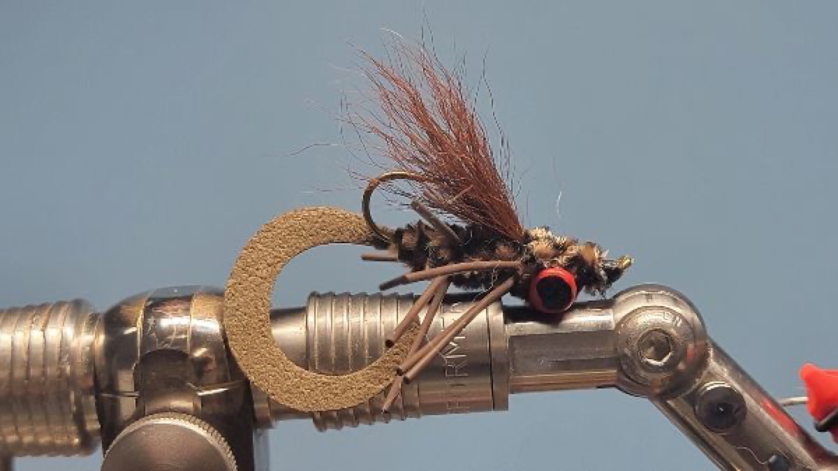 Curly Tail Critter Bug fly pattern tied by Darrell Olson