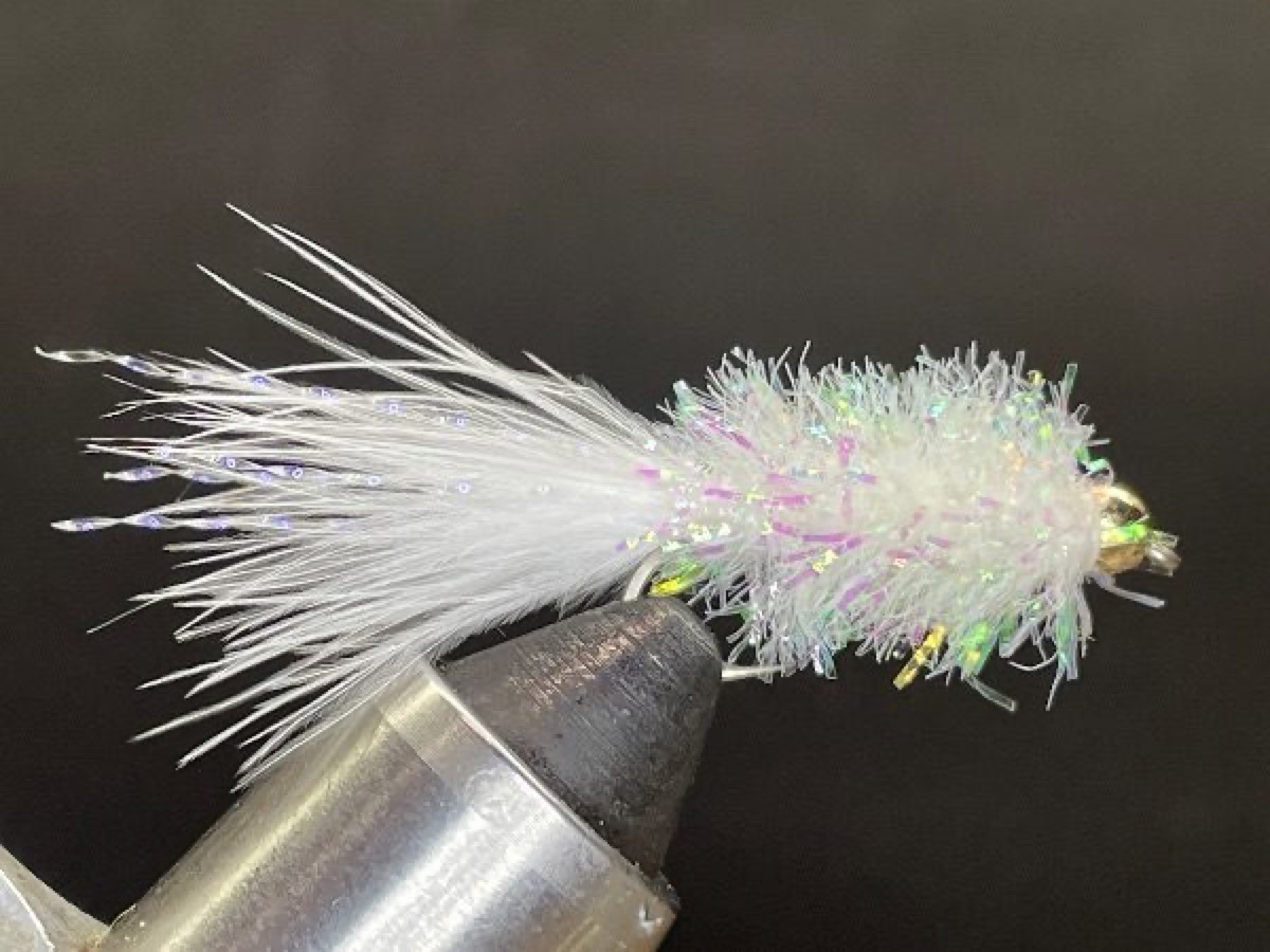 The White Crystal Buggar fly pattern tied by Brent Jones